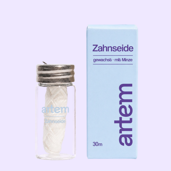 Zahnseide im Glas